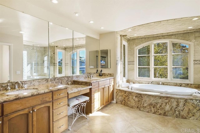 full bathroom with a garden tub, tile patterned flooring, walk in shower, vanity, and recessed lighting