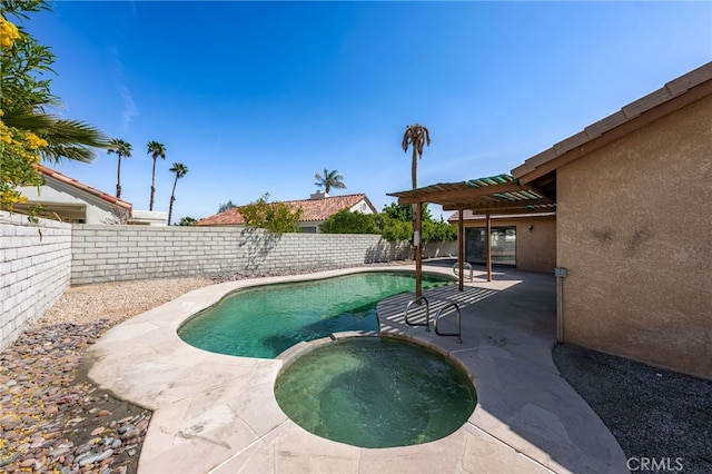 view of swimming pool featuring a pergola, a pool with connected hot tub, a fenced backyard, and a patio area