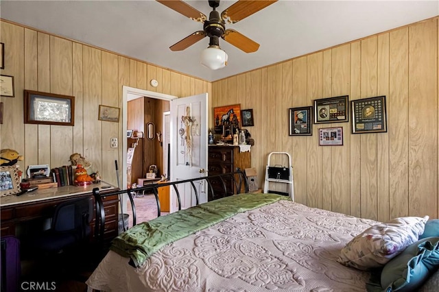 carpeted bedroom with wooden walls
