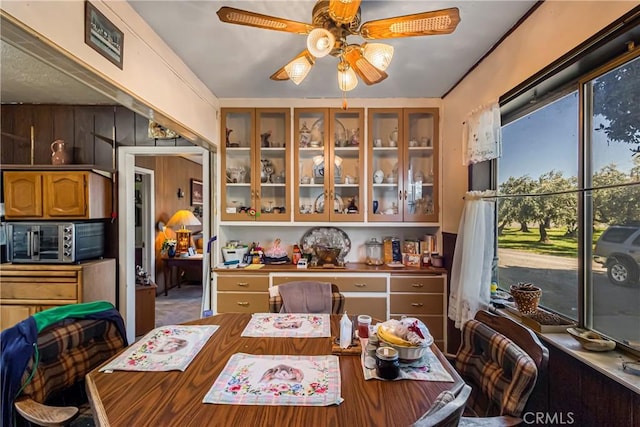 dining room featuring a toaster and a ceiling fan