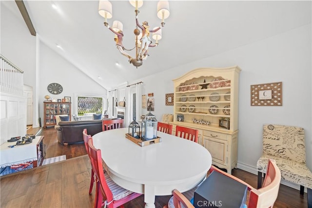 28102 Camellia Ct, Laguna Niguel, CA 92677 - dining area featuring wood finished floors, a chandelier, and high vaulted ceiling