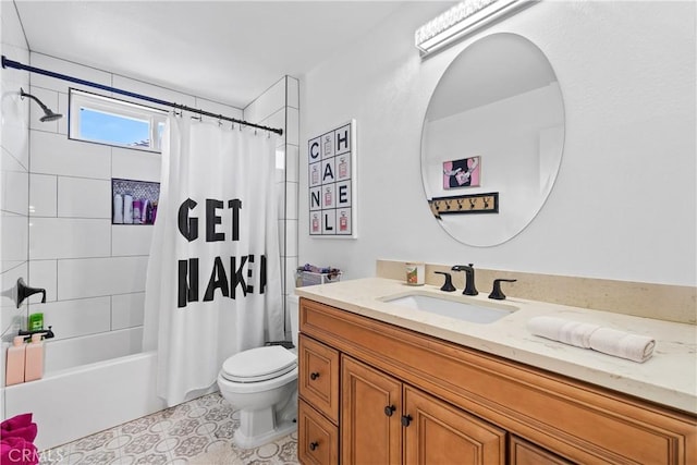bathroom featuring vanity, tile patterned floors, shower / bath combo with shower curtain, and toilet
