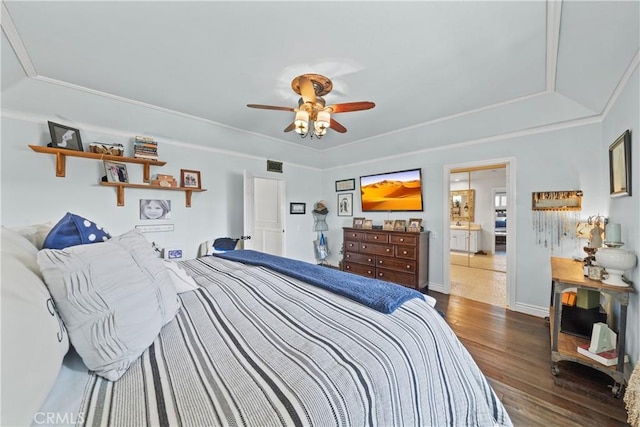 28102 Camellia Ct, Laguna Niguel, CA 92677 - bedroom with visible vents, ornamental molding, wood finished floors, a tray ceiling, and a ceiling fan