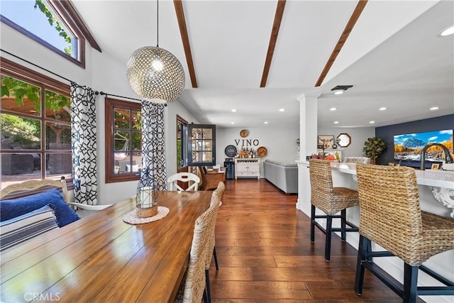 dining space with recessed lighting, decorative columns, vaulted ceiling with beams, and dark wood-type flooring