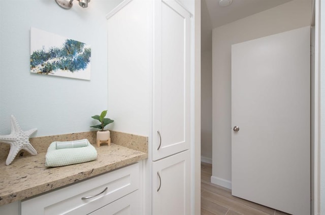 bathroom featuring wood finished floors