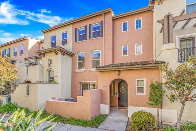1295 Blue Jean Way Unit 2, Chula Vista, CA 91913 - multi unit property featuring a tile roof, fence private yard, and stucco siding