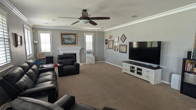 carpeted living room featuring a ceiling fan, baseboards, a fireplace, and ornamental molding