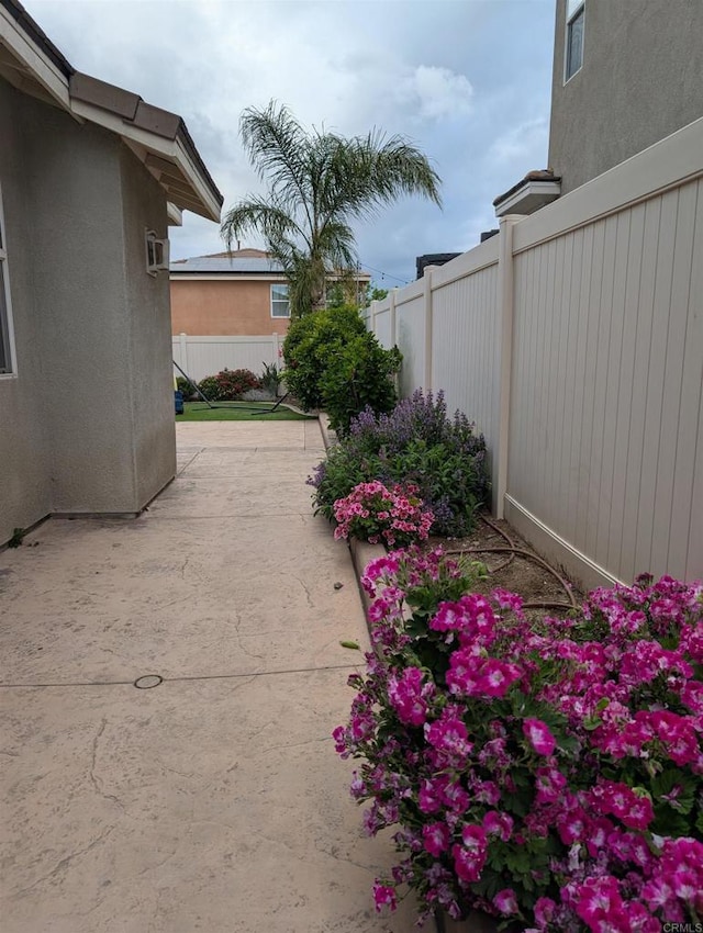 view of patio with fence
