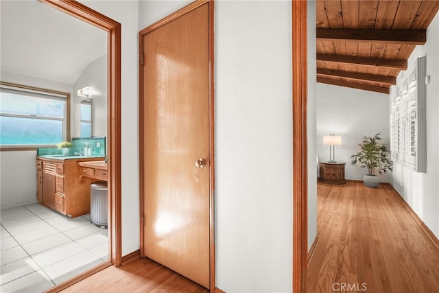 15731 Marlin Pl, Van Nuys, CA 91406 - hallway with wooden ceiling, lofted ceiling with beams, and light wood-type flooring