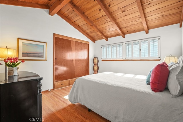 15731 Marlin Pl, Van Nuys, CA 91406 - bedroom with light wood-style floors, wooden ceiling, vaulted ceiling with beams, and a closet