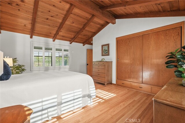 15731 Marlin Pl, Van Nuys, CA 91406 - bedroom featuring lofted ceiling with beams, wood ceiling, and light wood-type flooring