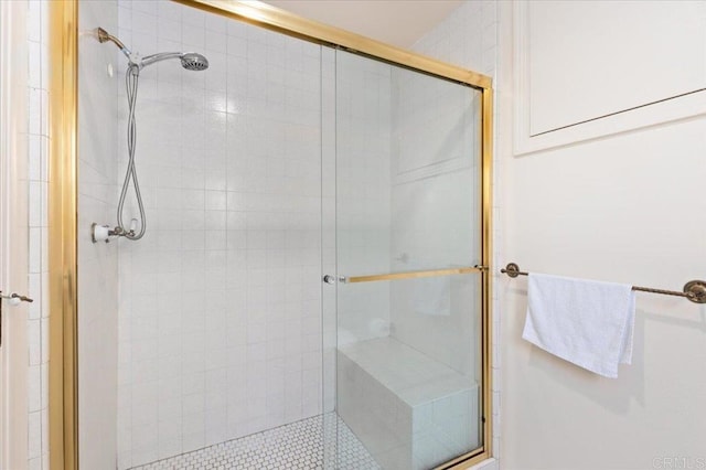 bathroom with a stall shower