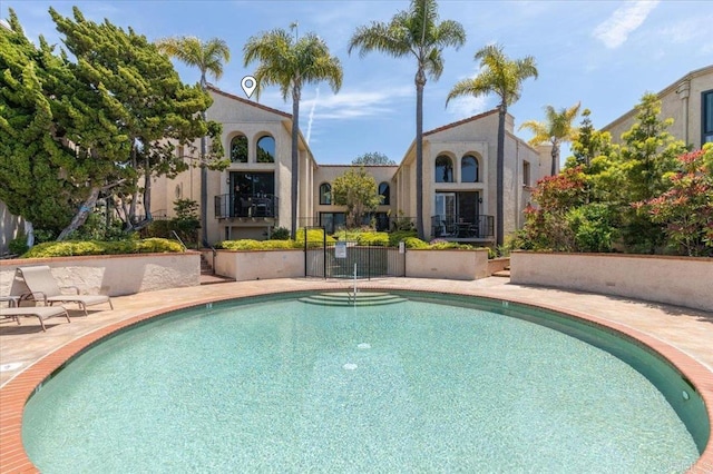 pool featuring a patio