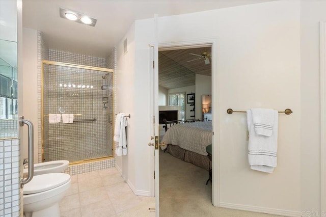bathroom with connected bathroom, toilet, baseboards, a shower stall, and a bidet