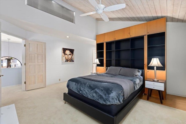 bedroom featuring visible vents, a ceiling fan, wood ceiling, and vaulted ceiling