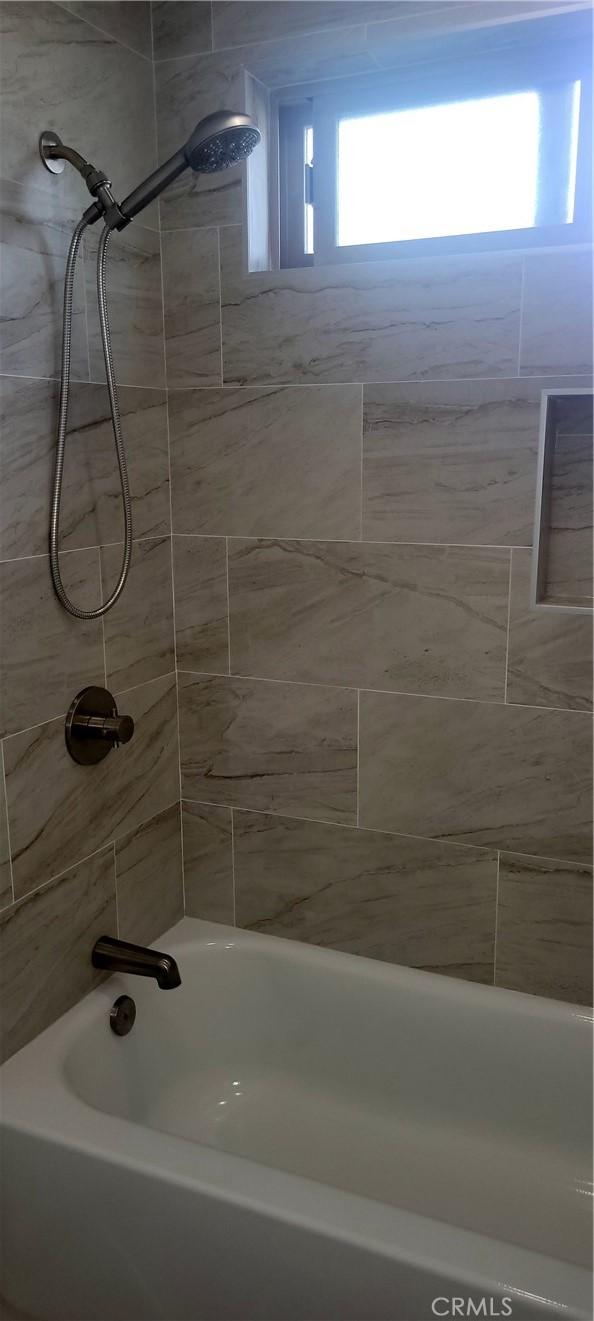 full bath with shower / bath combination