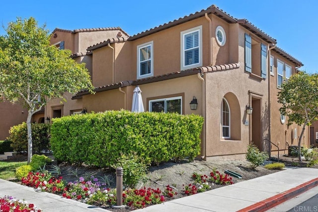 17011 Calle Trevino Unit 5, San Diego, CA 92127 - mediterranean / spanish house with stucco siding and a tiled roof