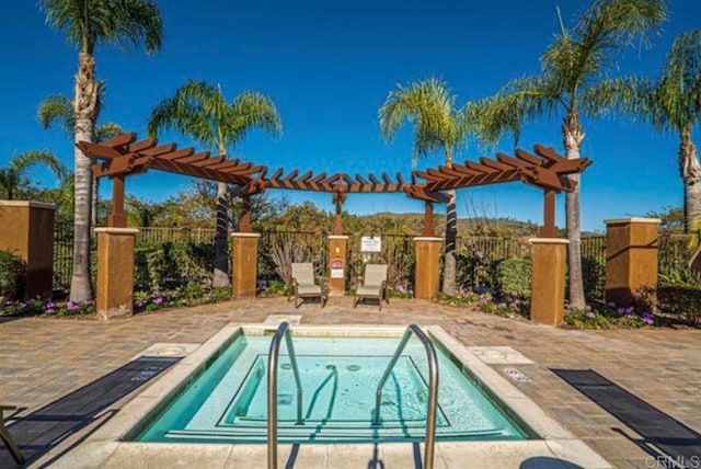 17011 Calle Trevino Unit 5, San Diego, CA 92127 - view of pool featuring a patio, fence, a pergola, and a pool