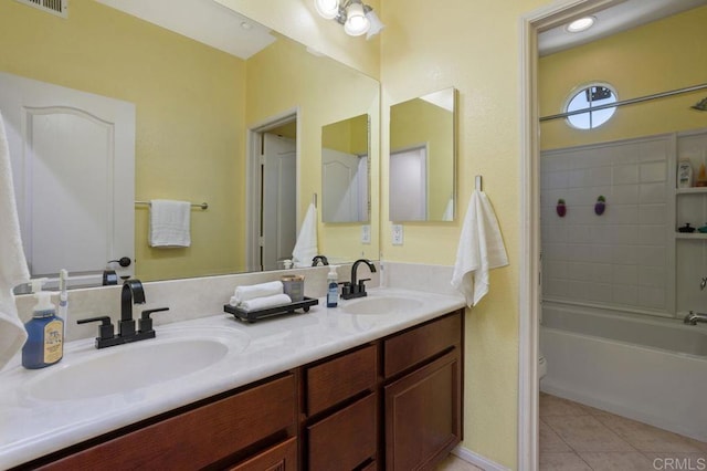 17011 Calle Trevino Unit 5, San Diego, CA 92127 - bathroom with double vanity, toilet, a sink, and tile patterned flooring