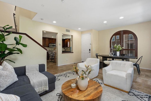 17011 Calle Trevino Unit 5, San Diego, CA 92127 - living area featuring recessed lighting, baseboards, and visible vents
