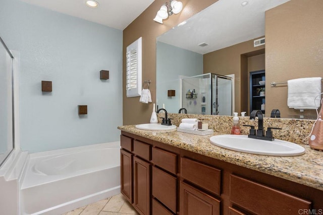 17011 Calle Trevino Unit 5, San Diego, CA 92127 - bathroom featuring visible vents, a sink, a garden tub, and a stall shower