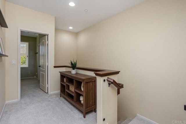 17011 Calle Trevino Unit 5, San Diego, CA 92127 - hall with baseboards, recessed lighting, and light colored carpet