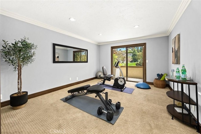 exercise area featuring baseboards, carpet flooring, crown molding, and recessed lighting