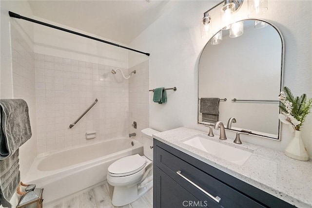 full bathroom with vanity, shower / bathtub combination, and toilet