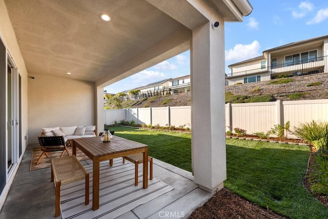 view of patio featuring a fenced backyard and an outdoor hangout area