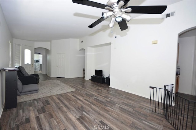 31105 Sunningdale Dr, Temecula, CA 92591 - living room with arched walkways, ceiling fan, and wood finished floors