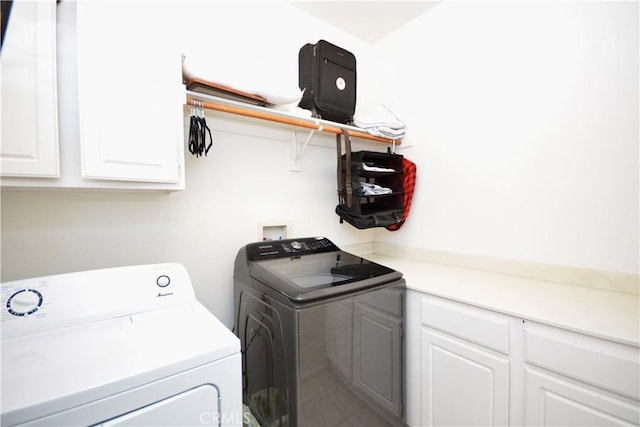 31105 Sunningdale Dr, Temecula, CA 92591 - washroom featuring washing machine and clothes dryer and cabinet space