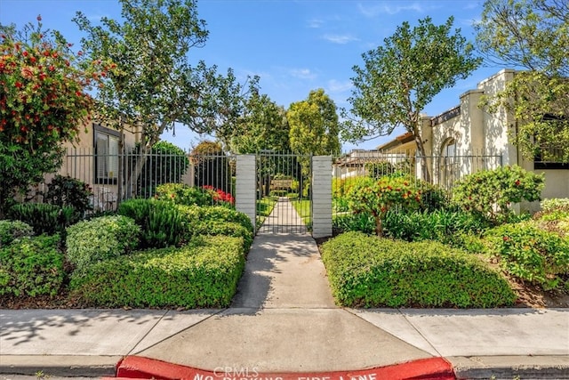 view of gate featuring fence