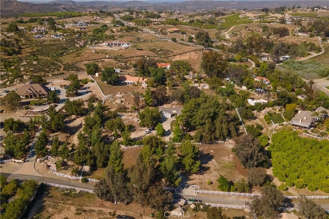 drone / aerial view featuring a mountain view