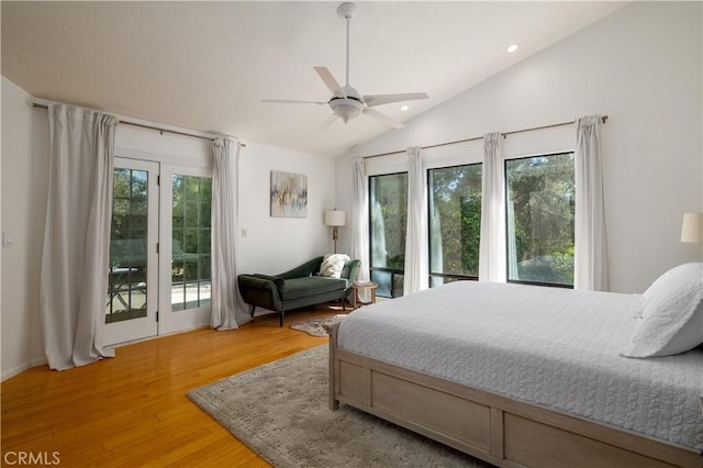 bedroom with recessed lighting, vaulted ceiling, light wood-style flooring, a ceiling fan, and access to exterior