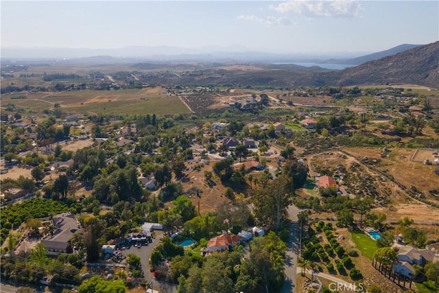 birds eye view of property featuring a mountain view