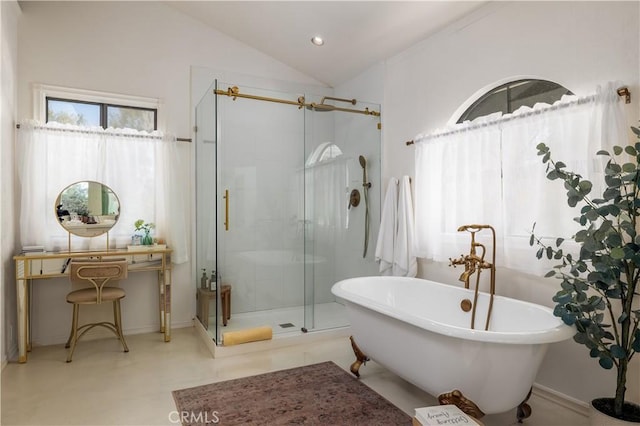 bathroom featuring recessed lighting, baseboards, a shower stall, a freestanding tub, and vaulted ceiling