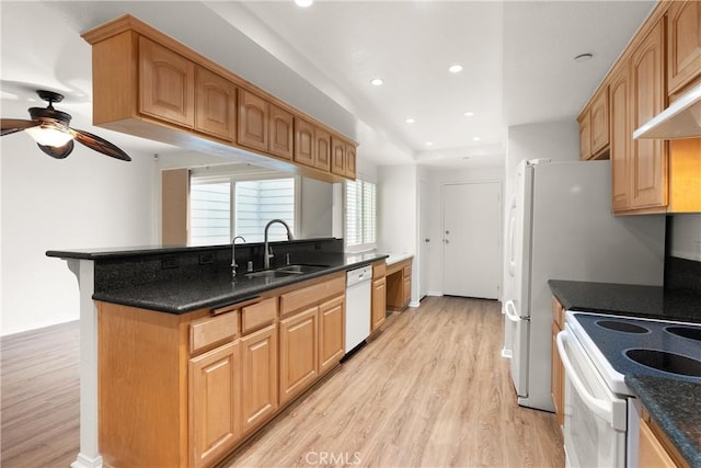 19116 Queensport Ln Unit B, Huntington Beach, CA 92646 - kitchen with light wood-style floors, a sink, ceiling fan, and white appliances