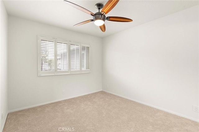 19116 Queensport Ln Unit B, Huntington Beach, CA 92646 - unfurnished room with baseboards, carpet flooring, and a ceiling fan