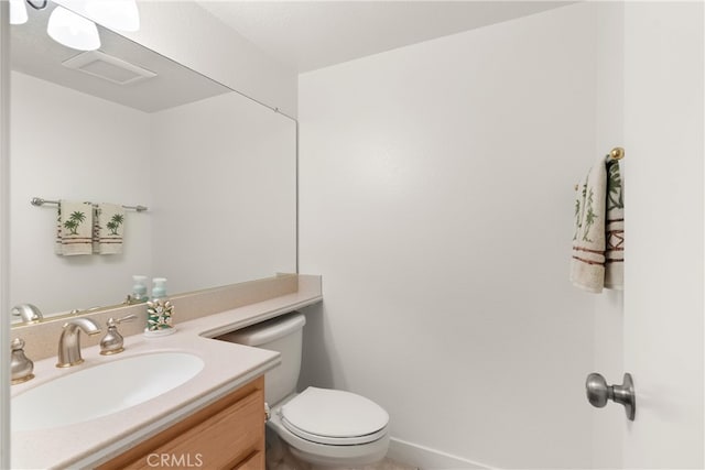 19116 Queensport Ln Unit B, Huntington Beach, CA 92646 - half bath with vanity, visible vents, and toilet