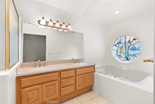19116 Queensport Ln Unit B, Huntington Beach, CA 92646 - full bath featuring a sink, tile patterned floors, double vanity, and a bath