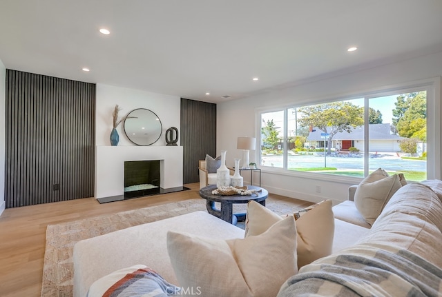 2027 Kornat Dr, Costa Mesa, CA 92626 - living room with recessed lighting, wood finished floors, and a large fireplace