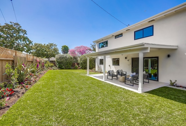 2027 Kornat Dr, Costa Mesa, CA 92626 - view of yard with a patio and an outdoor hangout area