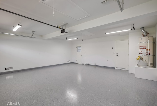 2027 Kornat Dr, Costa Mesa, CA 92626 - garage featuring strapped water heater and a garage door opener