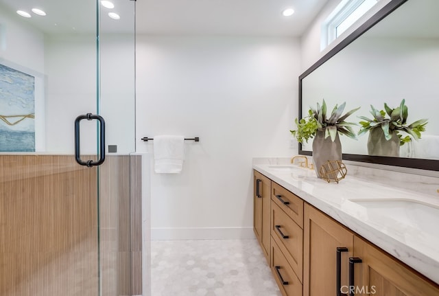 2027 Kornat Dr, Costa Mesa, CA 92626 - full bath featuring double vanity, baseboards, recessed lighting, and an enclosed shower
