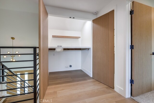 2027 Kornat Dr, Costa Mesa, CA 92626 - walk in closet featuring wood finished floors