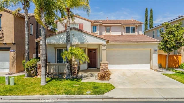 32674 Clearvail Dr, Temecula, CA 92592 - view of front of property featuring stucco siding, concrete driveway, a tiled roof, a front lawn, and covered porch