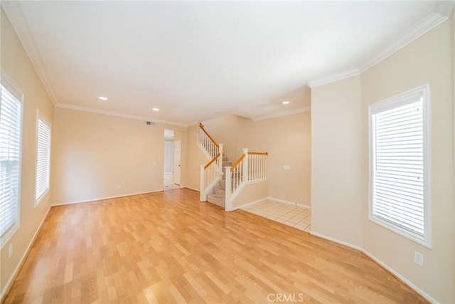 32674 Clearvail Dr, Temecula, CA 92592 - unfurnished living room featuring light wood-style flooring, stairway, ornamental molding, recessed lighting, and baseboards
