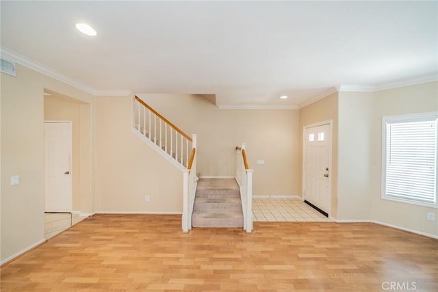 32674 Clearvail Dr, Temecula, CA 92592 - foyer with light wood finished floors, stairway, crown molding, recessed lighting, and baseboards