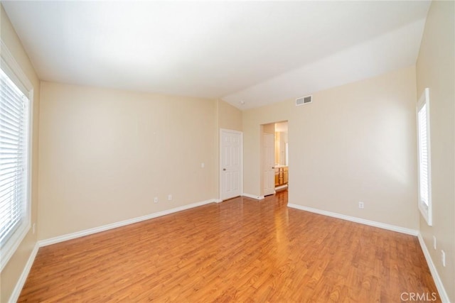 32674 Clearvail Dr, Temecula, CA 92592 - spare room with light wood-style flooring, baseboards, and lofted ceiling