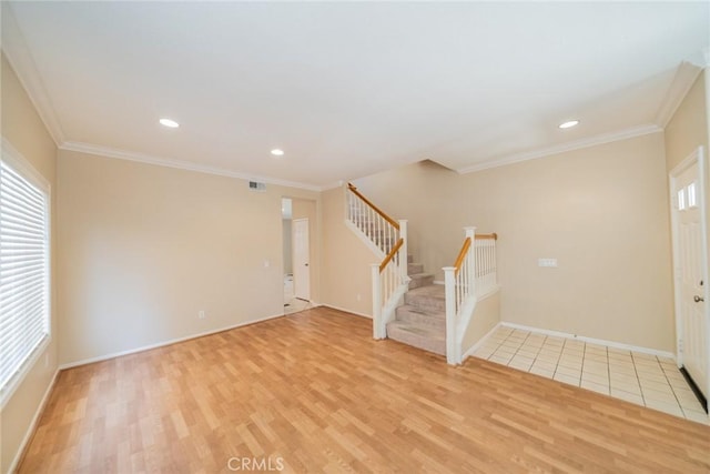 32674 Clearvail Dr, Temecula, CA 92592 - foyer featuring stairway, light wood-type flooring, healthy amount of natural light, baseboards, and crown molding
